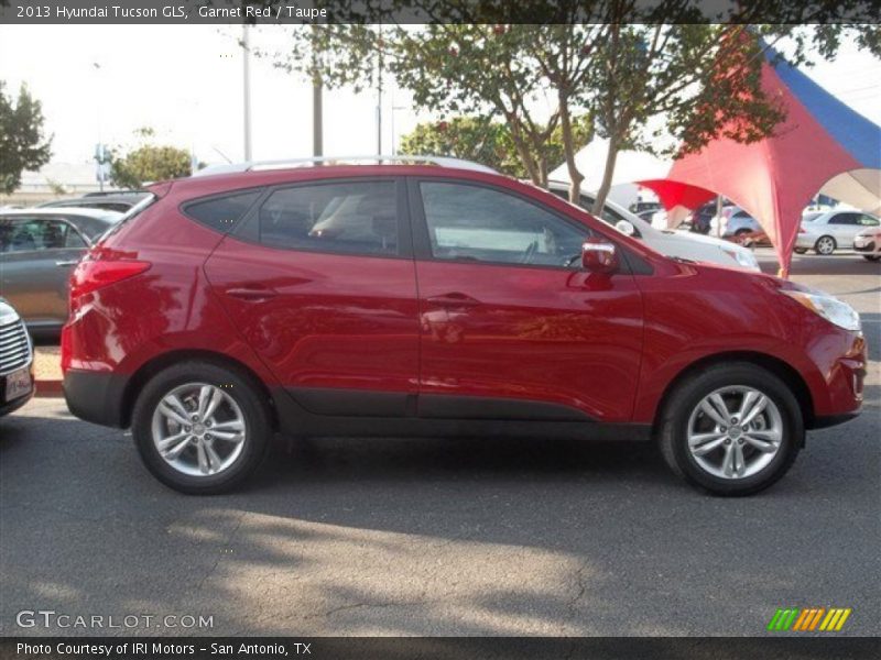 Garnet Red / Taupe 2013 Hyundai Tucson GLS