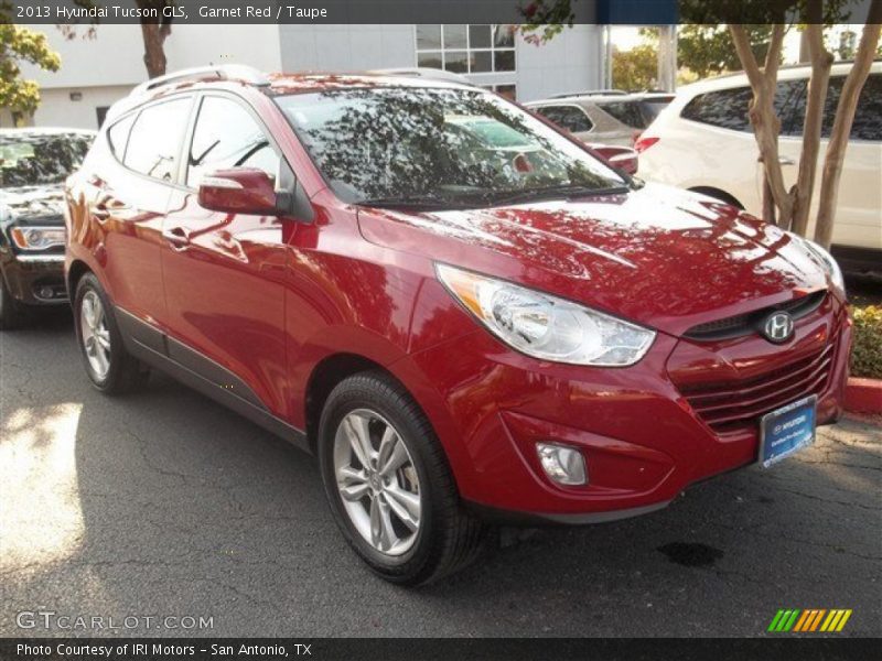 Garnet Red / Taupe 2013 Hyundai Tucson GLS