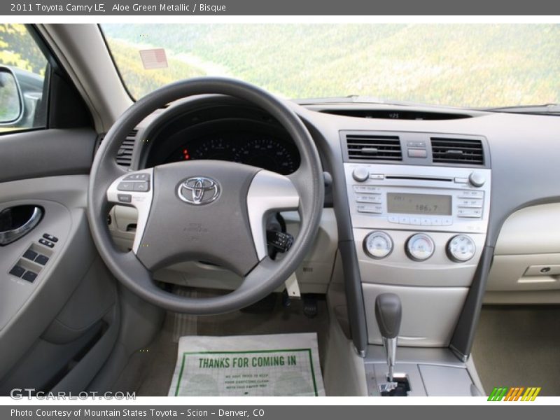 Aloe Green Metallic / Bisque 2011 Toyota Camry LE