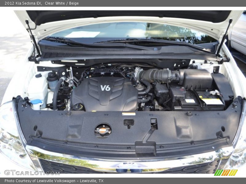 Clear White / Beige 2012 Kia Sedona EX