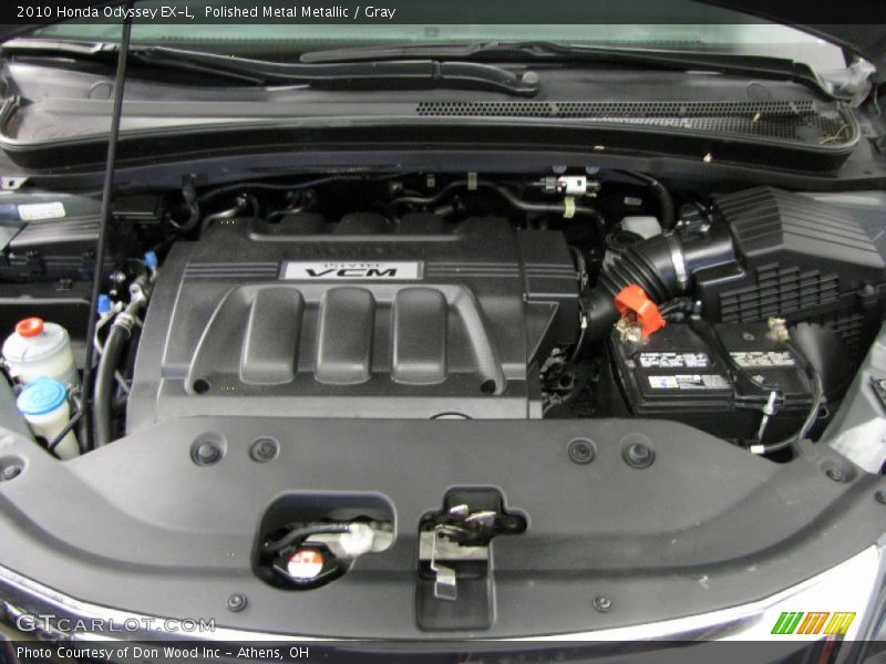 Polished Metal Metallic / Gray 2010 Honda Odyssey EX-L