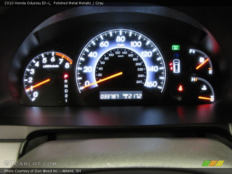 Polished Metal Metallic / Gray 2010 Honda Odyssey EX-L