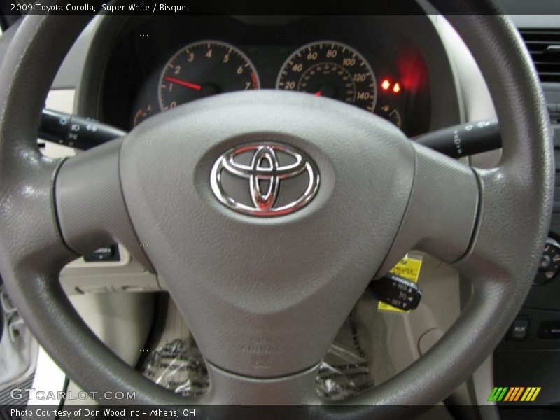Super White / Bisque 2009 Toyota Corolla