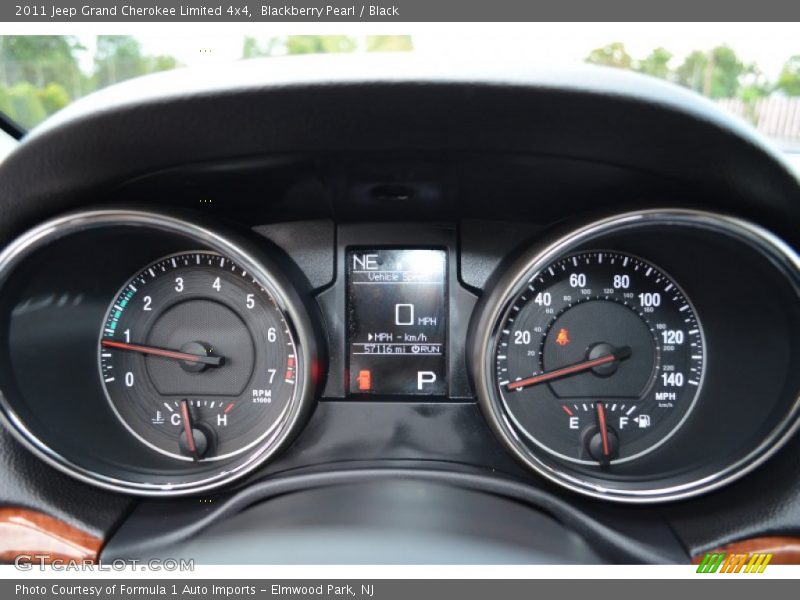 Blackberry Pearl / Black 2011 Jeep Grand Cherokee Limited 4x4