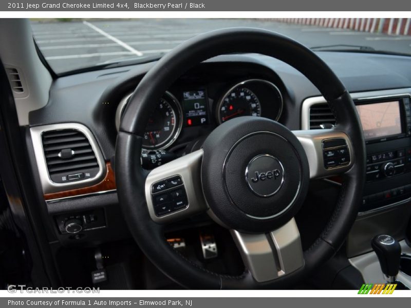 Blackberry Pearl / Black 2011 Jeep Grand Cherokee Limited 4x4