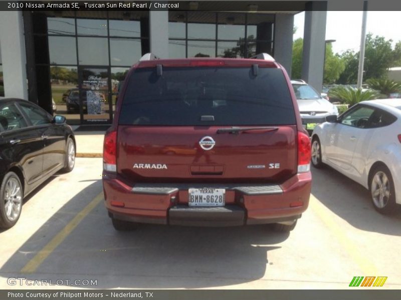 Tuscan Sun Red Pearl / Charcoal 2010 Nissan Armada SE