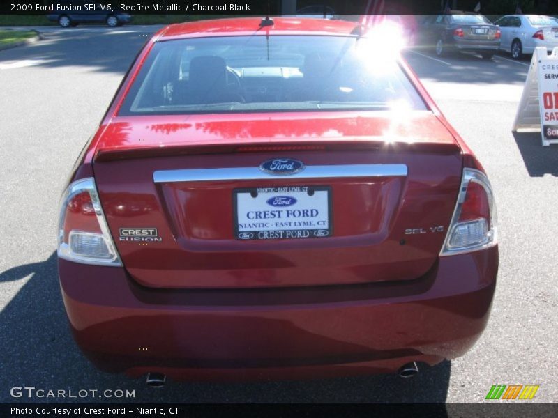 Redfire Metallic / Charcoal Black 2009 Ford Fusion SEL V6