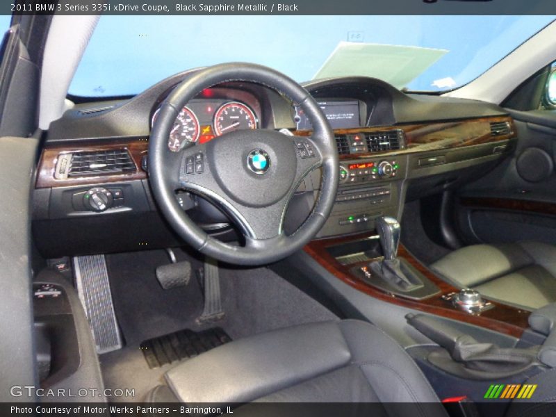 Black Sapphire Metallic / Black 2011 BMW 3 Series 335i xDrive Coupe