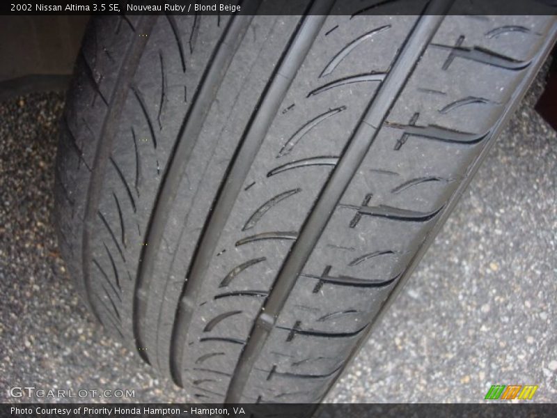 Nouveau Ruby / Blond Beige 2002 Nissan Altima 3.5 SE