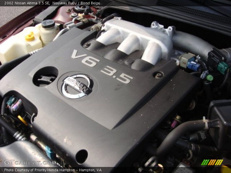 Nouveau Ruby / Blond Beige 2002 Nissan Altima 3.5 SE