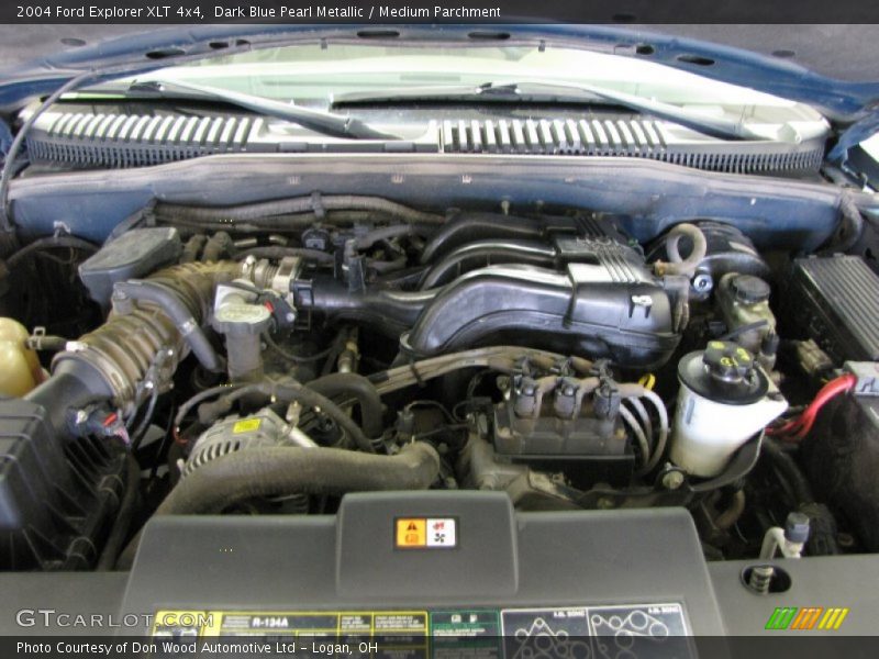 Dark Blue Pearl Metallic / Medium Parchment 2004 Ford Explorer XLT 4x4