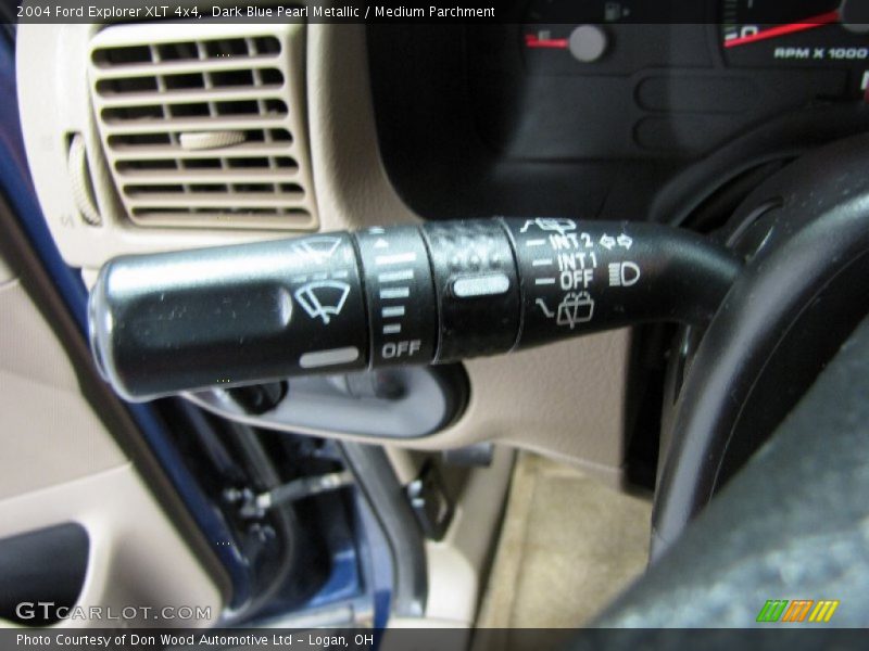 Dark Blue Pearl Metallic / Medium Parchment 2004 Ford Explorer XLT 4x4