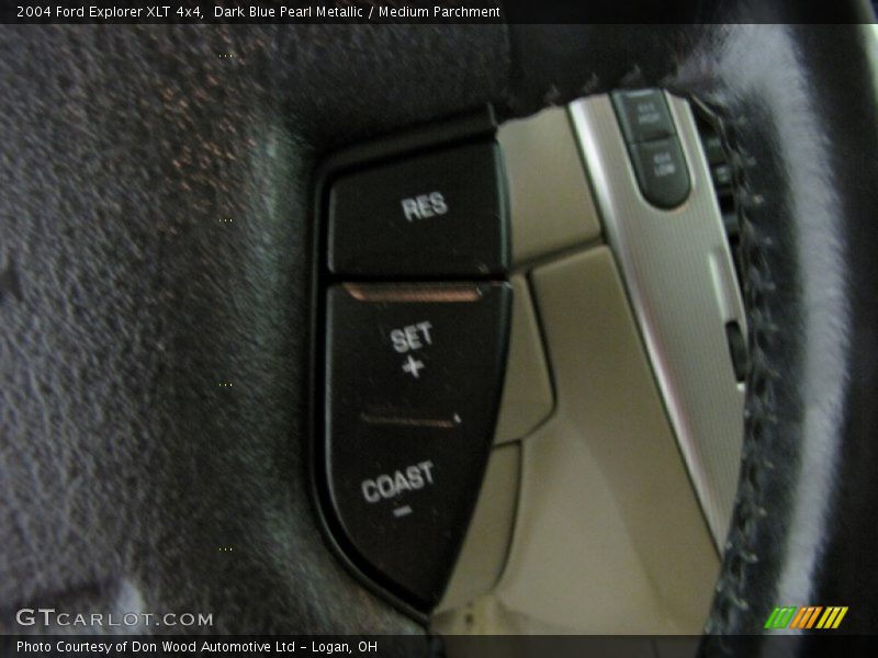 Dark Blue Pearl Metallic / Medium Parchment 2004 Ford Explorer XLT 4x4