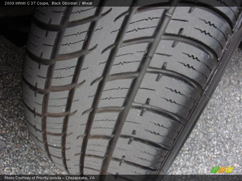 Black Obsidian / Wheat 2009 Infiniti G 37 Coupe