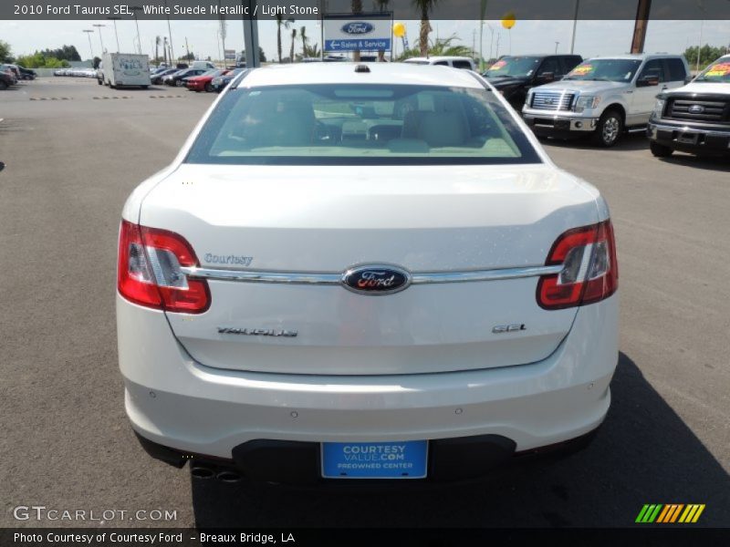 White Suede Metallic / Light Stone 2010 Ford Taurus SEL