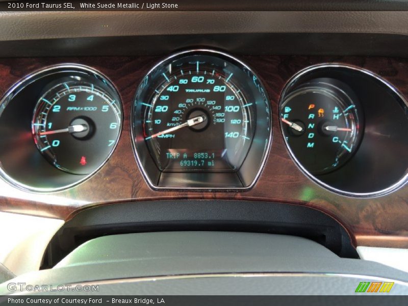 White Suede Metallic / Light Stone 2010 Ford Taurus SEL