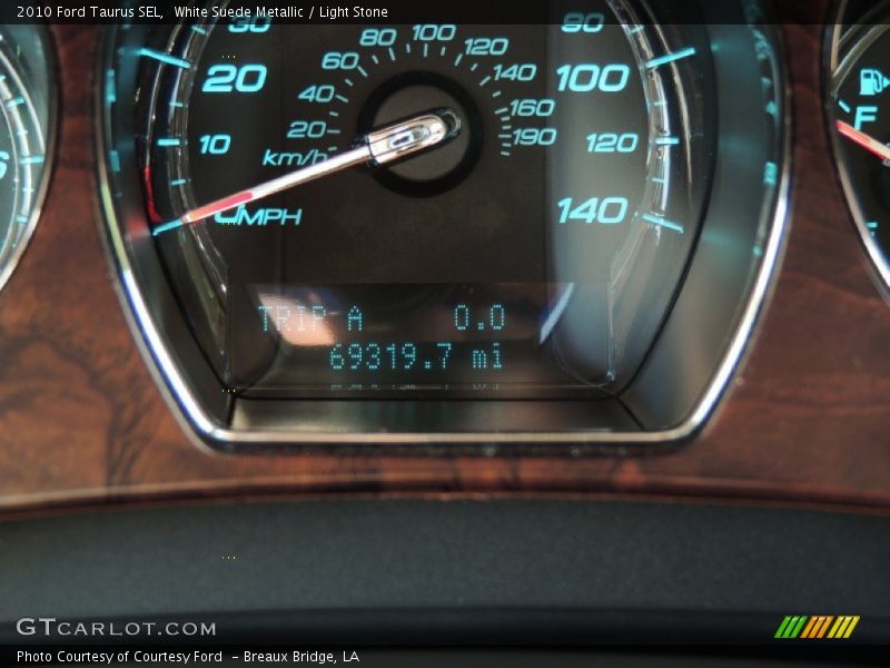 White Suede Metallic / Light Stone 2010 Ford Taurus SEL