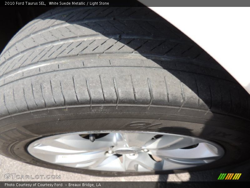 White Suede Metallic / Light Stone 2010 Ford Taurus SEL