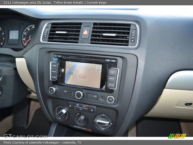Toffee Brown Metallic / Cornsilk Beige 2011 Volkswagen Jetta SEL Sedan