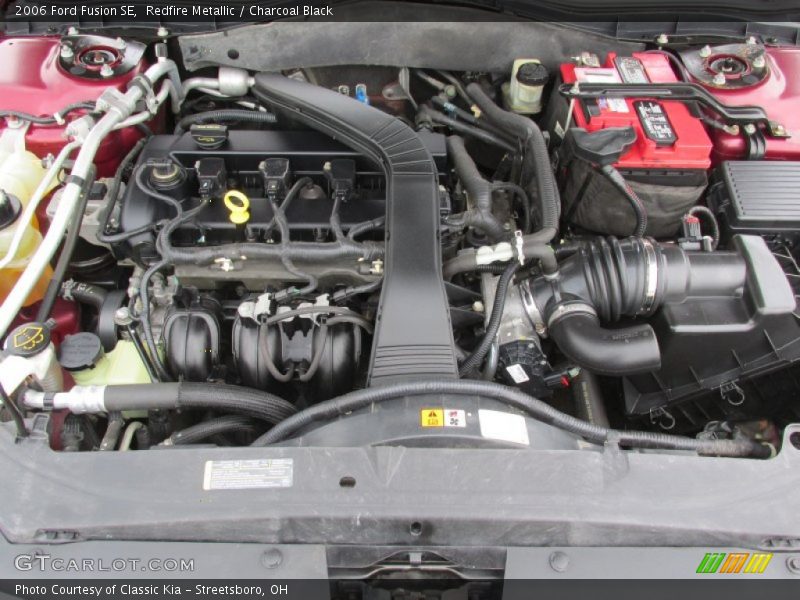 Redfire Metallic / Charcoal Black 2006 Ford Fusion SE