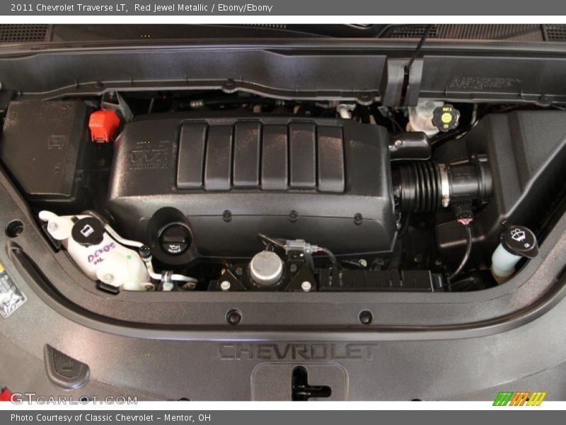 Red Jewel Metallic / Ebony/Ebony 2011 Chevrolet Traverse LT