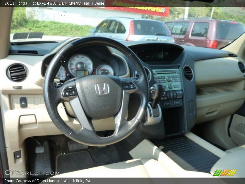 Dark Cherry Pearl / Beige 2011 Honda Pilot EX-L 4WD