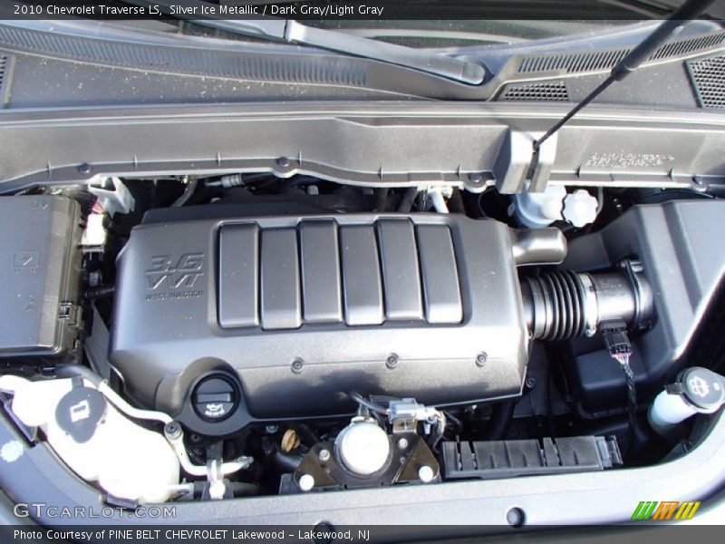 Silver Ice Metallic / Dark Gray/Light Gray 2010 Chevrolet Traverse LS