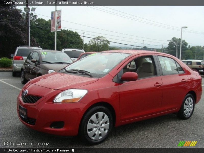 Barcelona Red Metallic / Bisque 2009 Toyota Yaris S Sedan