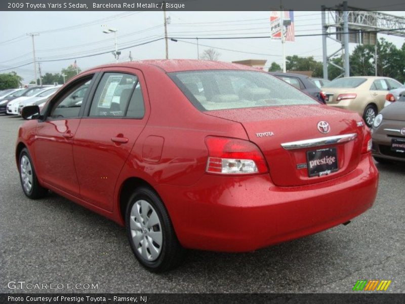 Barcelona Red Metallic / Bisque 2009 Toyota Yaris S Sedan