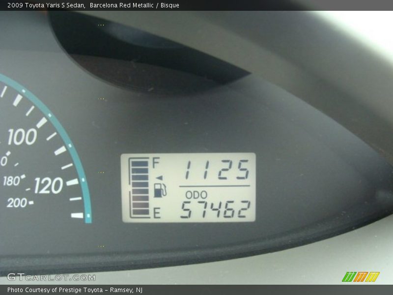 Barcelona Red Metallic / Bisque 2009 Toyota Yaris S Sedan