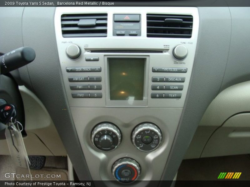 Barcelona Red Metallic / Bisque 2009 Toyota Yaris S Sedan