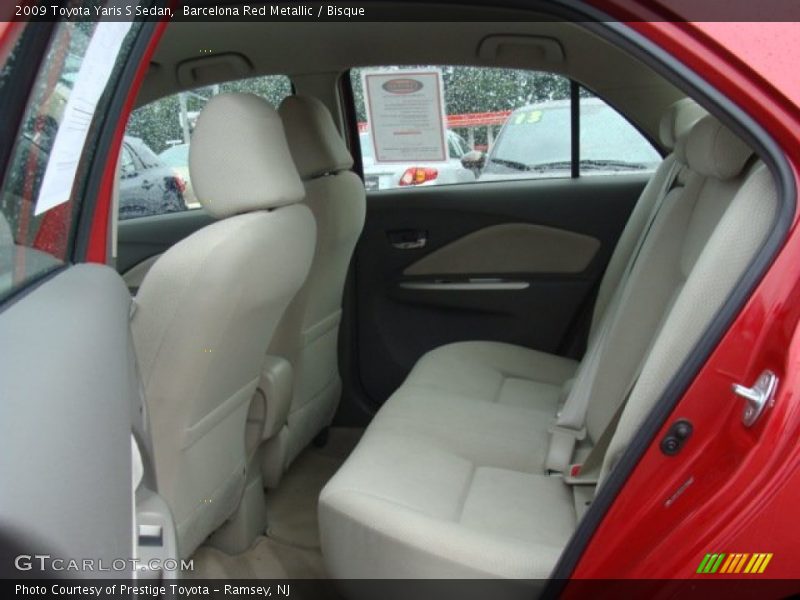Barcelona Red Metallic / Bisque 2009 Toyota Yaris S Sedan
