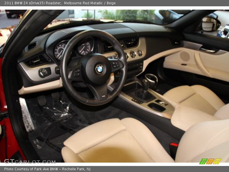 Melbourne Red Metallic / Beige 2011 BMW Z4 sDrive35i Roadster