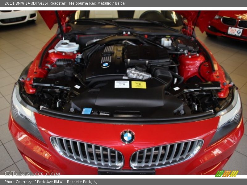 Melbourne Red Metallic / Beige 2011 BMW Z4 sDrive35i Roadster