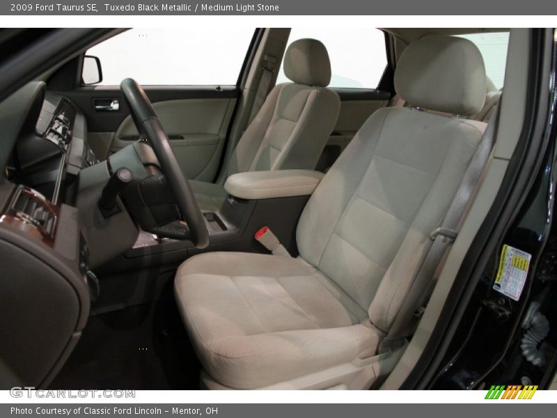 Tuxedo Black Metallic / Medium Light Stone 2009 Ford Taurus SE