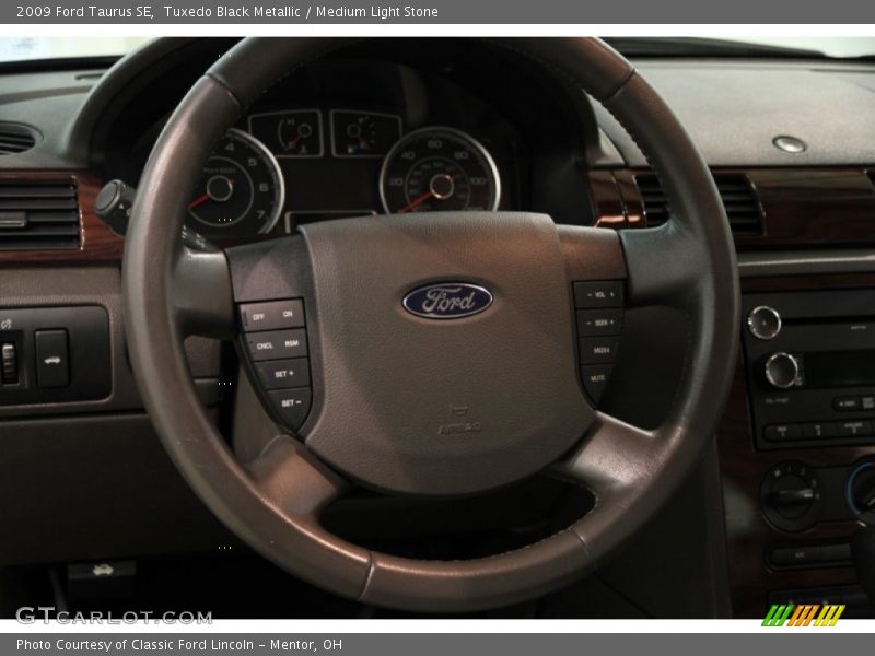 Tuxedo Black Metallic / Medium Light Stone 2009 Ford Taurus SE
