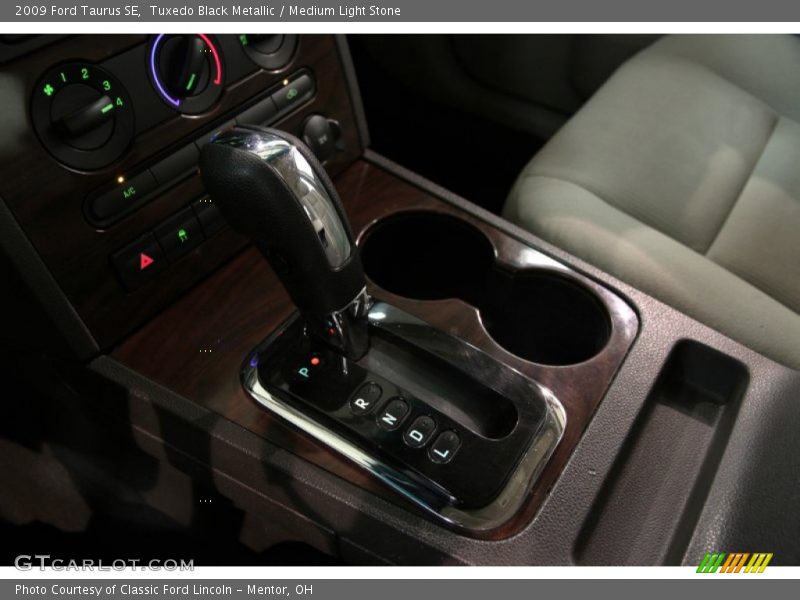 Tuxedo Black Metallic / Medium Light Stone 2009 Ford Taurus SE