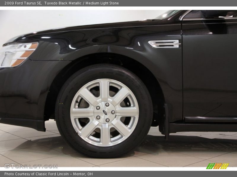 Tuxedo Black Metallic / Medium Light Stone 2009 Ford Taurus SE