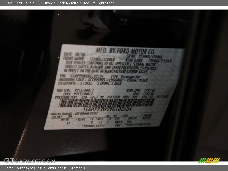 Tuxedo Black Metallic / Medium Light Stone 2009 Ford Taurus SE