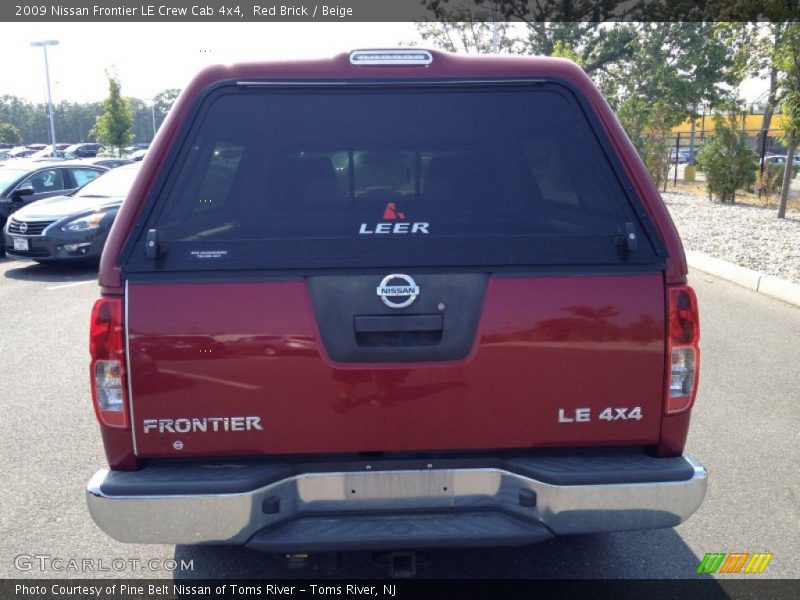 Red Brick / Beige 2009 Nissan Frontier LE Crew Cab 4x4