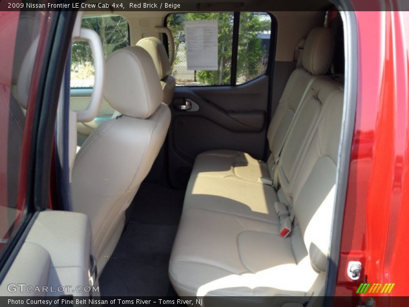 Red Brick / Beige 2009 Nissan Frontier LE Crew Cab 4x4