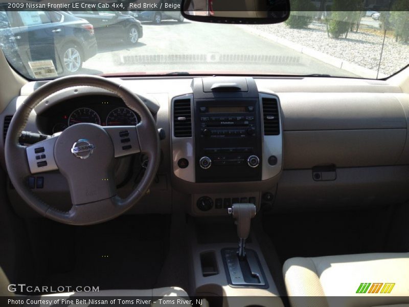 Red Brick / Beige 2009 Nissan Frontier LE Crew Cab 4x4