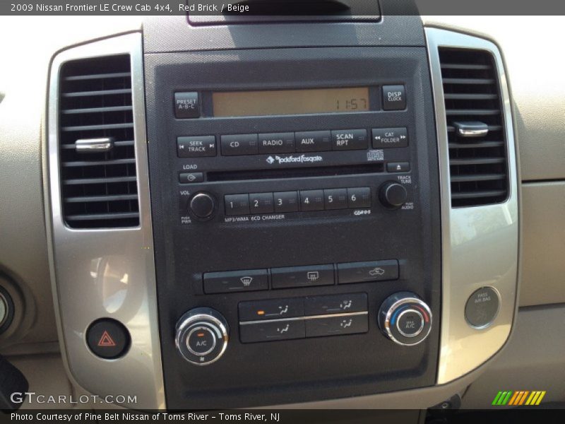 Red Brick / Beige 2009 Nissan Frontier LE Crew Cab 4x4