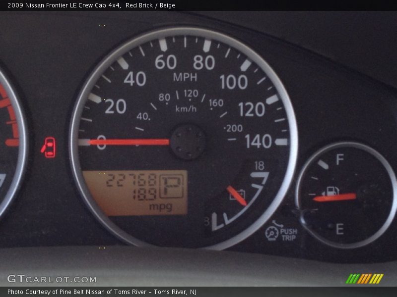 Red Brick / Beige 2009 Nissan Frontier LE Crew Cab 4x4