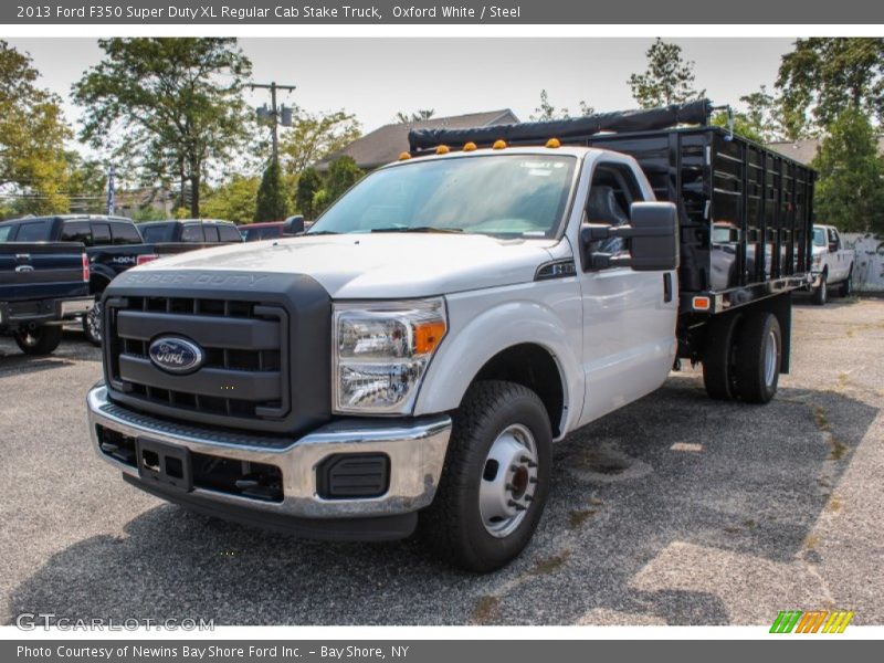Front 3/4 View of 2013 F350 Super Duty XL Regular Cab Stake Truck
