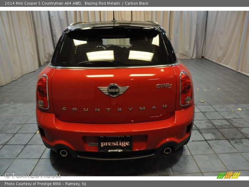 Blazing Red Metallic / Carbon Black 2014 Mini Cooper S Countryman All4 AWD