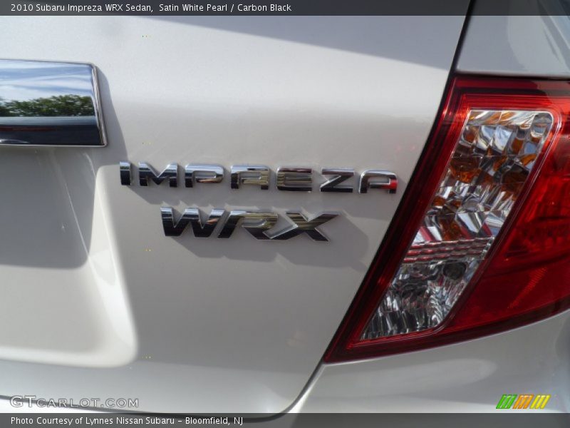 Satin White Pearl / Carbon Black 2010 Subaru Impreza WRX Sedan