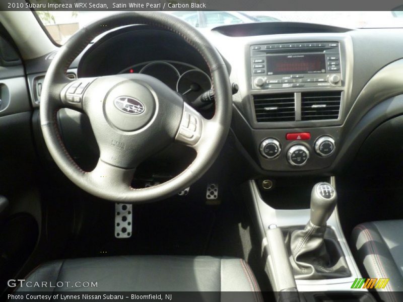 Satin White Pearl / Carbon Black 2010 Subaru Impreza WRX Sedan