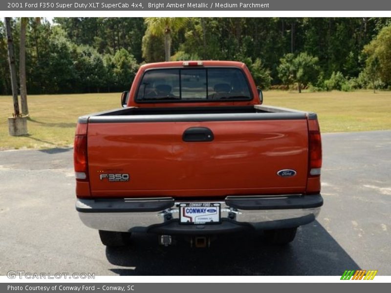 Bright Amber Metallic / Medium Parchment 2001 Ford F350 Super Duty XLT SuperCab 4x4