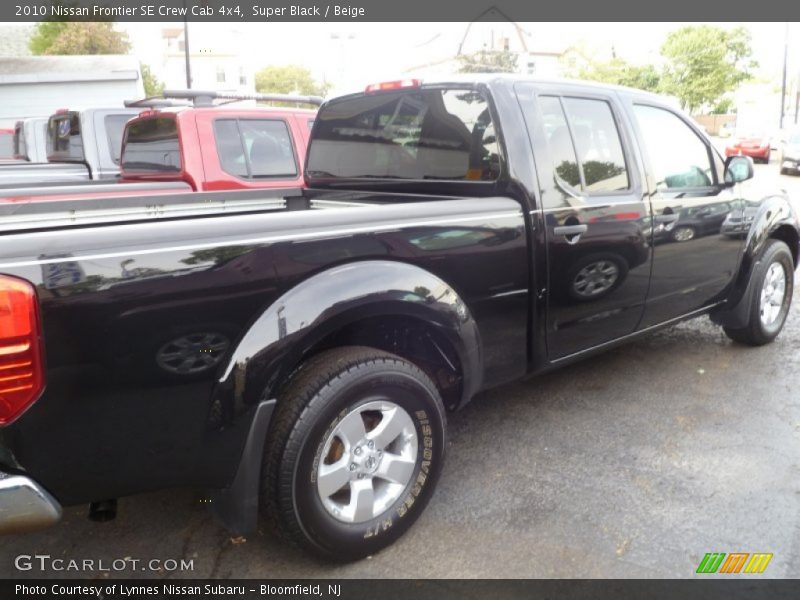 Super Black / Beige 2010 Nissan Frontier SE Crew Cab 4x4
